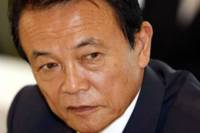 Глава минфина Японии на фоне скандала вернет зарплату за год